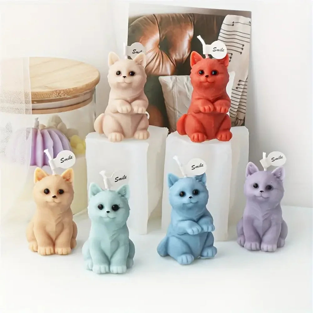 Six kitten example candles arranged at different heights around white silicone molds