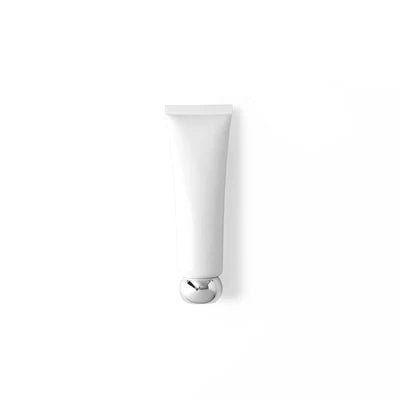Single white squeeze tube with a rounded silver-tone screw cap