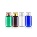 Green, brown, clear and blue mini PET bottles with copper-tone, gold-tone and silver-tone screw caps