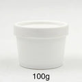 White empty round plastic jar with a matching white lid