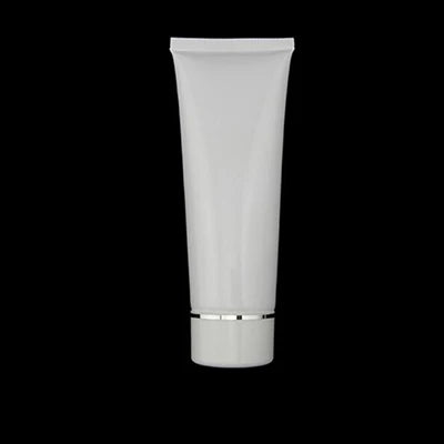 White squeeze tube with white cap and silver-tone band, style 10