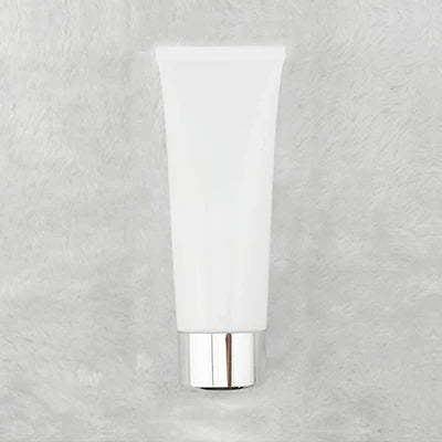 White squeeze tube with silver-tone cylindrical cap, style 12
