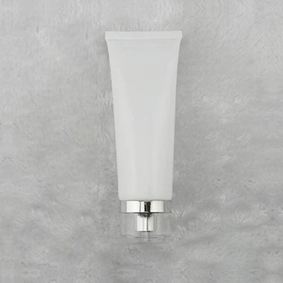 White squeeze tube with silver-tone dispensing closure, style 5