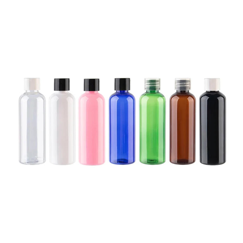 Clear, white, pink, blue, green, brown and black empty round screw-cap bottles