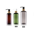 Brown, green and gray PET bottles with gold-tone collars and black or white pumps