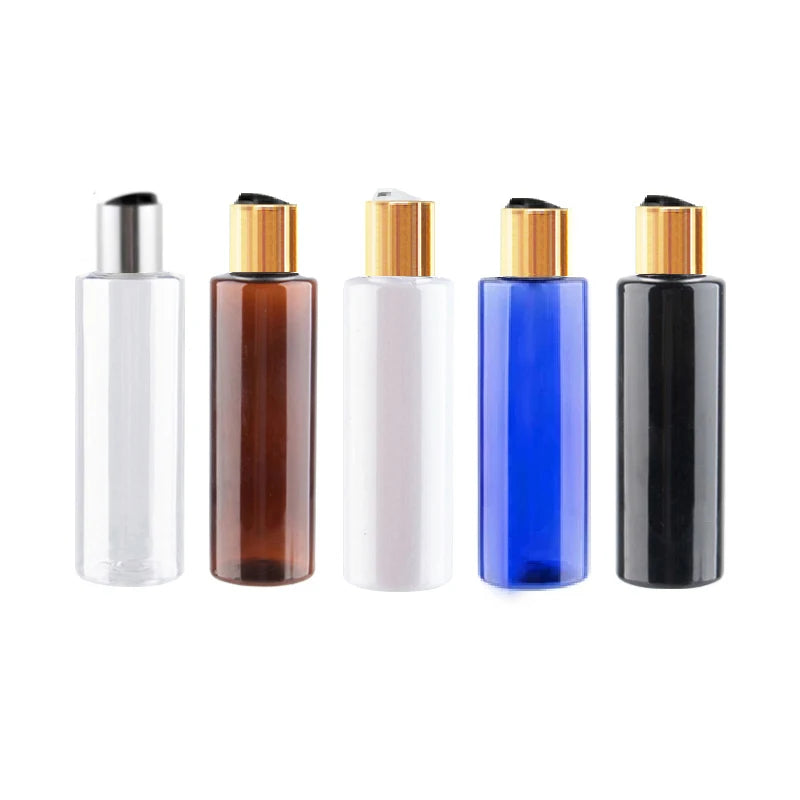Clear, brown, white, blue and black PET bottles with metallic-tone disc-top caps