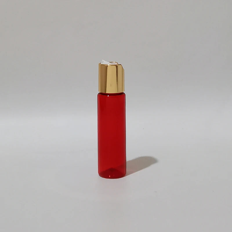 Red PET bottle with gold-tone disc-top cap and white insert, red-2