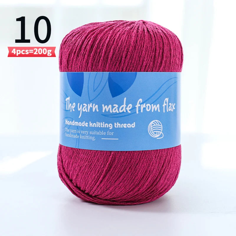 Deep pink linen lace yarn skein, color code 10, with a blue flax label.