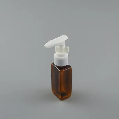 Brown rectangular PET bottle with white pump dispenser