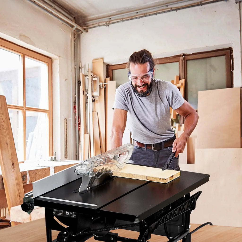 Man using a table saw in a workshop