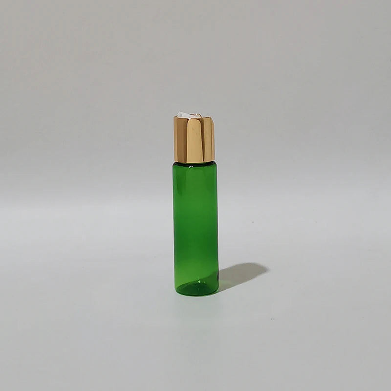 Green PET bottle with gold-tone disc-top cap and white insert, green-2