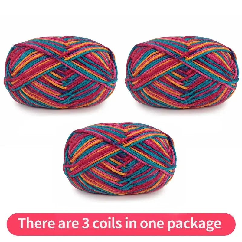 Three brightly variegated yarn skeins in pink, teal, orange and purple, shown as one package.