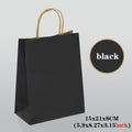 Black  gift bag with brown handle on a light gray background, labeled 'black'.