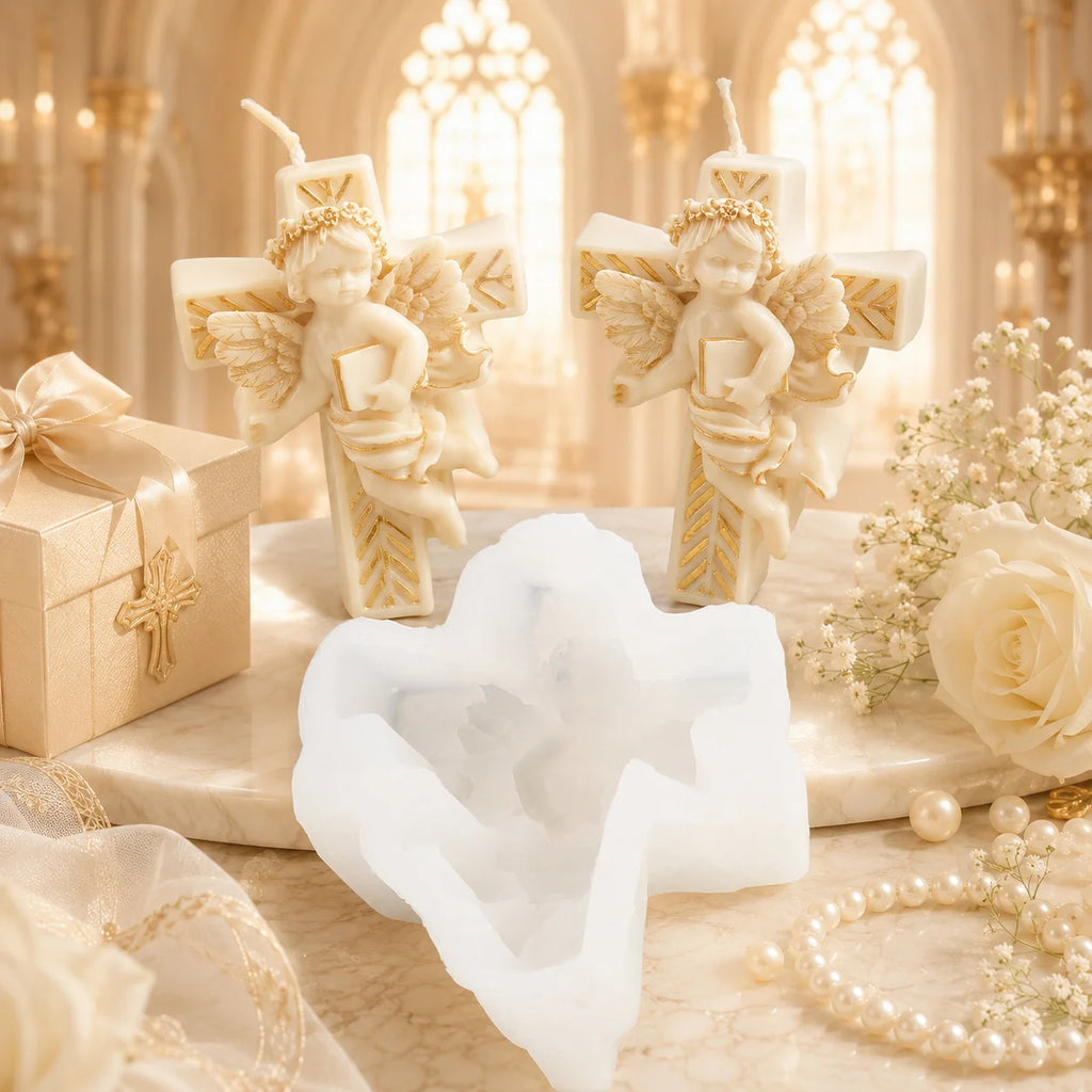 Two cherub cross example candles behind a white silicone mold, flowers and a gift box