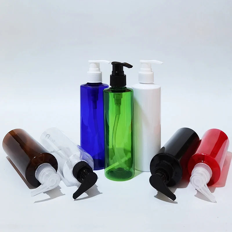 Round pump bottles standing upright and lying sideways in assorted colors