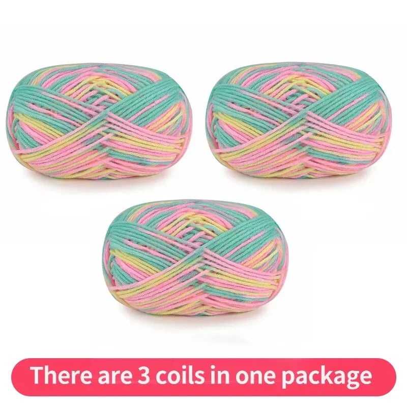 Three pastel variegated yarn skeins in mint, pink and yellow, shown as one package.
