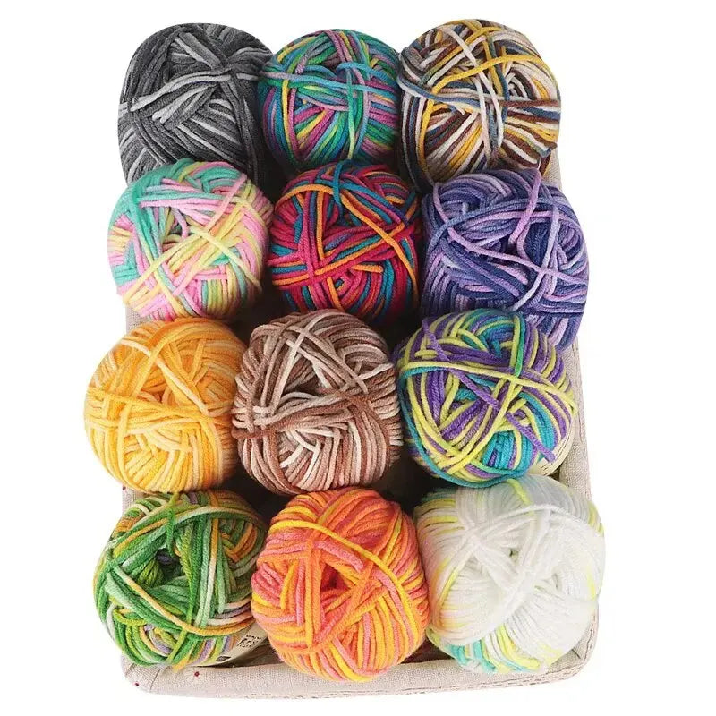 Tray displaying twelve yarn skeins in assorted bright, pastel and neutral colorways.