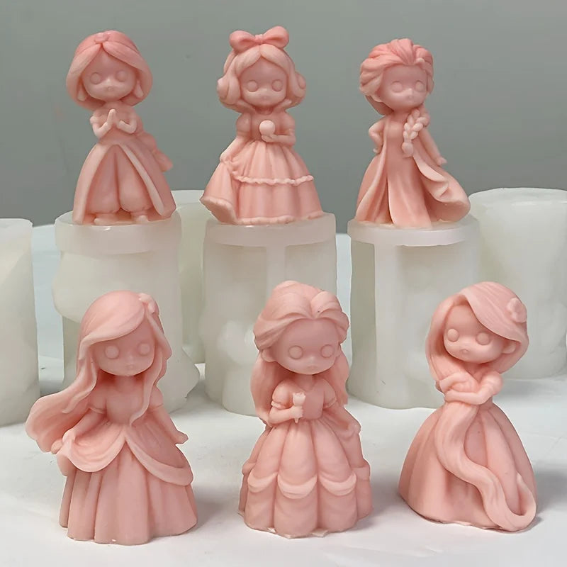 Six pink princess doll casting examples arranged in two rows with white silicone molds