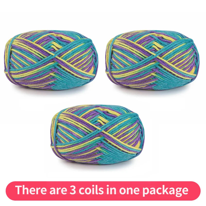 Three variegated yarn skeins in turquoise, purple and yellow, shown as one package.