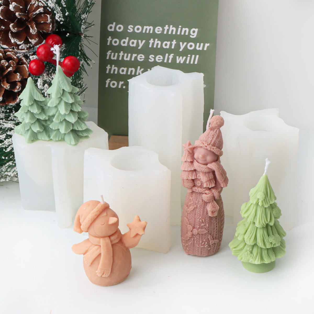 Snowman and Christmas tree casting examples arranged with white silicone molds