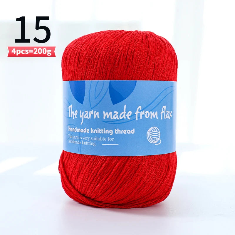 Bright red linen lace yarn skein, color code 15, with a blue flax label.
