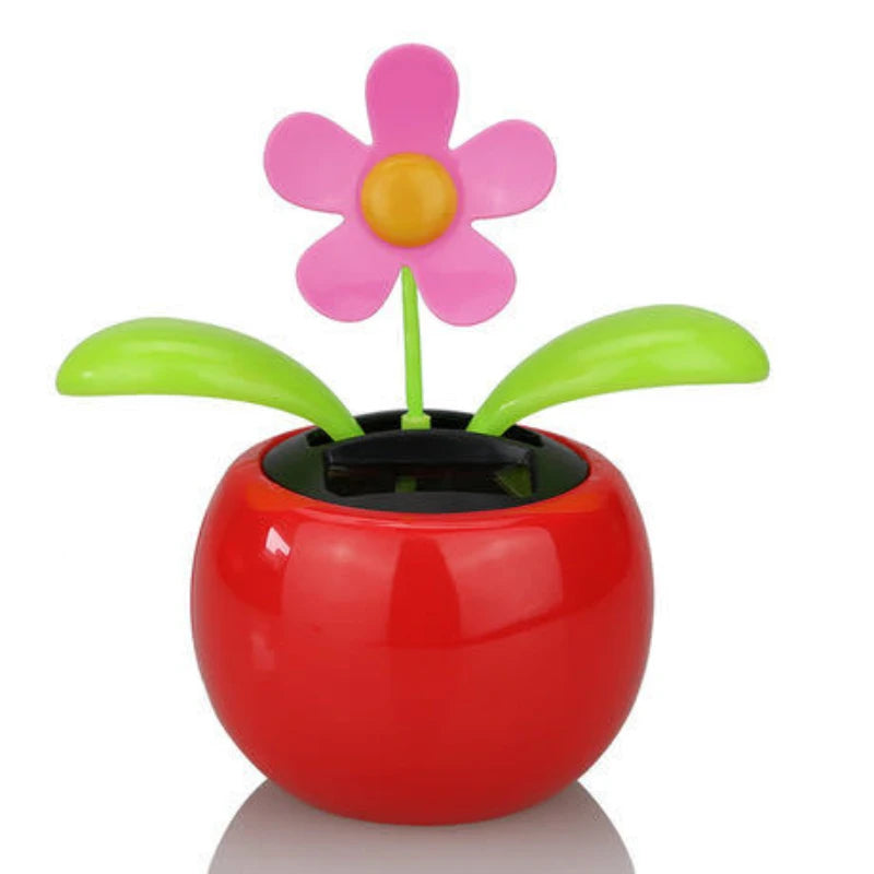 Toy flower with a red base on a white background