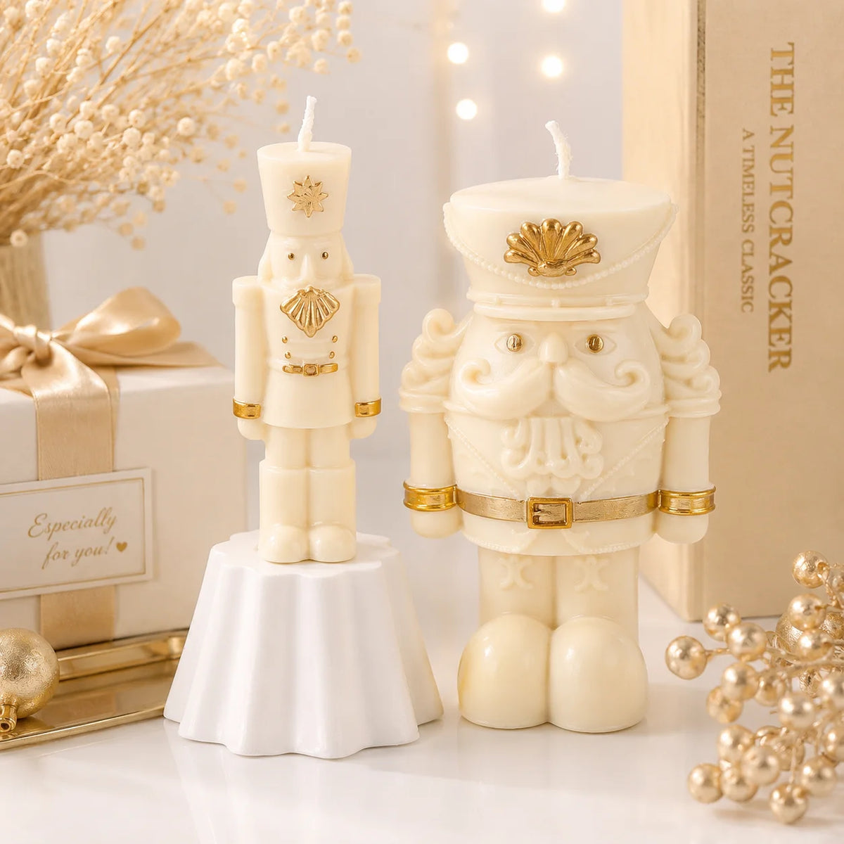 Slender and wide-bodied ivory nutcracker example candles with gold-colored hat and beard details