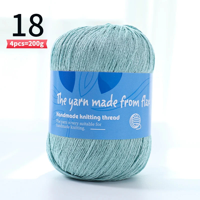 Pale aqua linen lace yarn skein, color code 18, with a blue flax label.