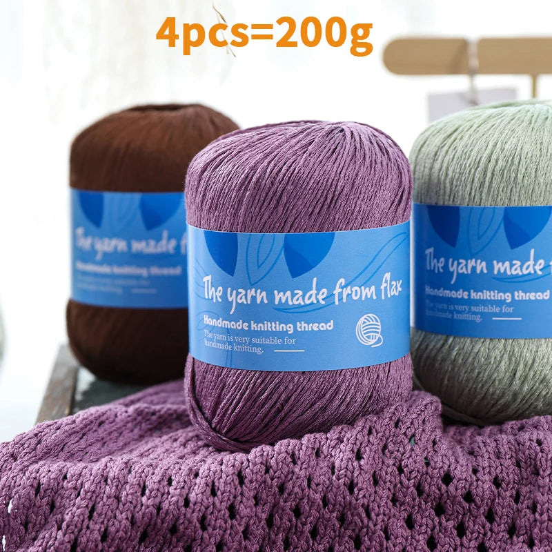 Purple linen lace yarn with a purple openwork swatch and brown and pale green skeins; four-skein pack shown as 200 g.
