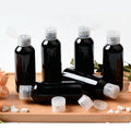 Black PET bottles with clear flip-top caps and spare closures