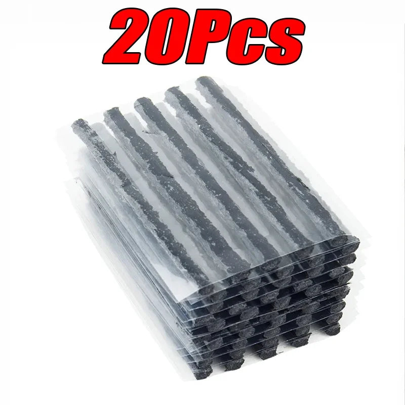 Pack of 20 black tire plugs in clear packaging on a white background