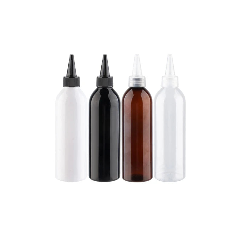 White, black, brown and clear round bottles with pointed-nozzle closures