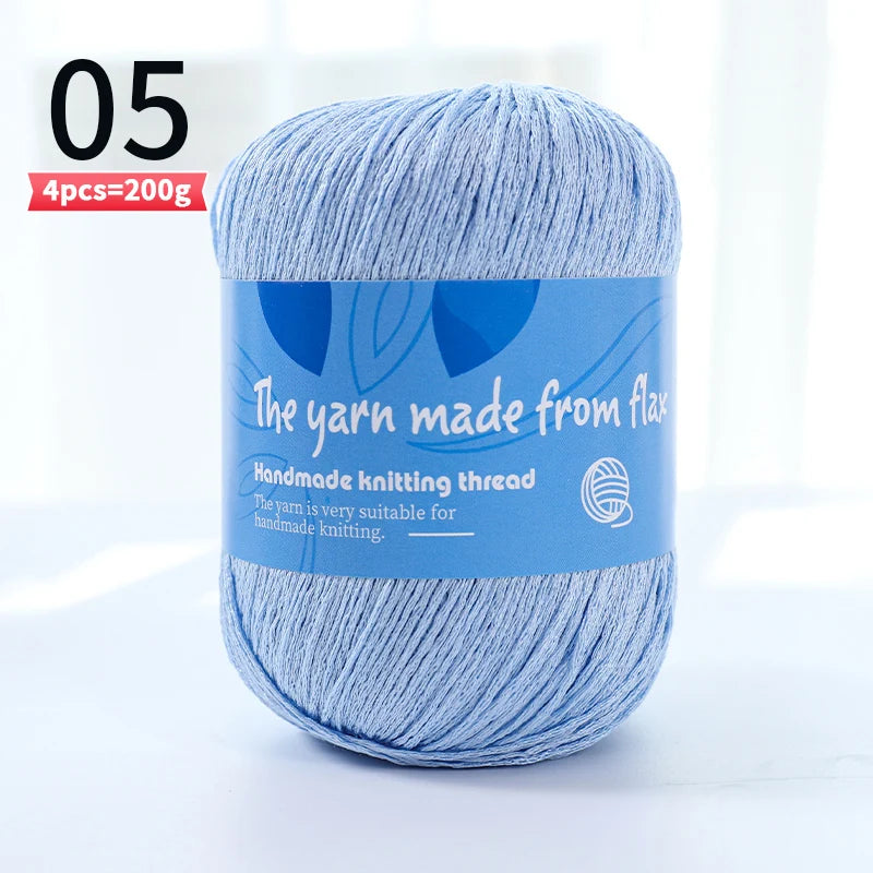 Light blue linen lace yarn skein, color code 05, with a blue flax label and four-skein pack marking.