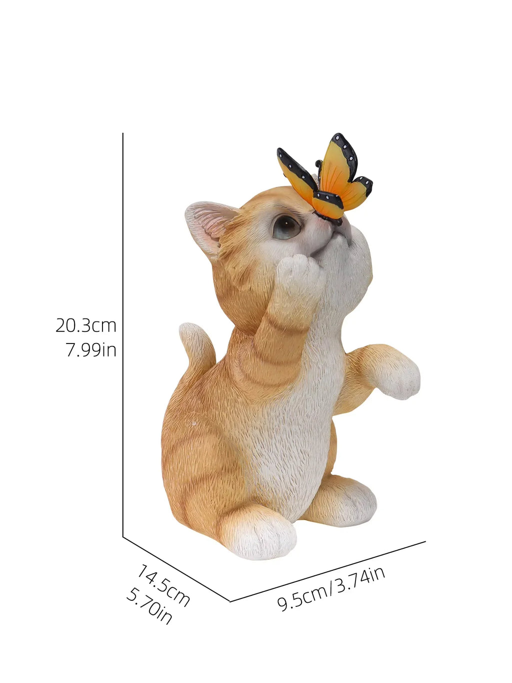 A small orange-and-white cat figurine with a yellow-and-black butterfly on its head, shown on a white background with dimension lines and measurements indicating 20.3 cm height, 14.