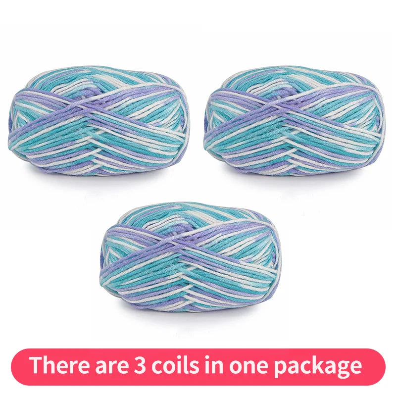 Three pastel yarn skeins in aqua, lavender and white, shown as one package.