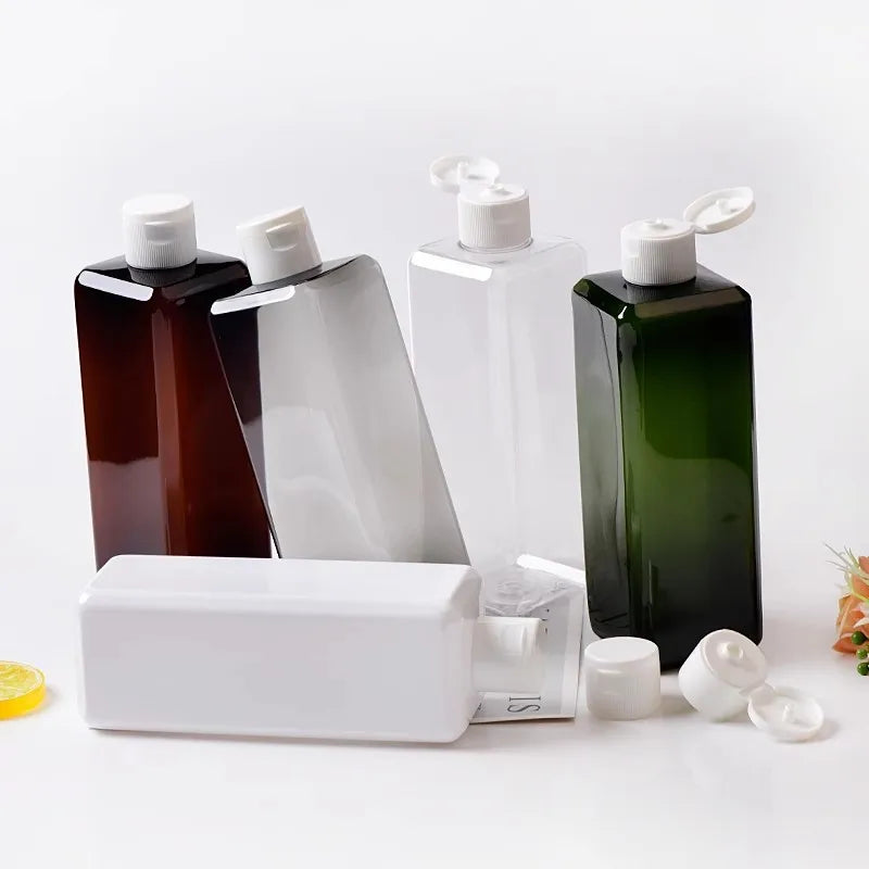 Square PET bottles in assorted colors with white flip-top caps, some shown open