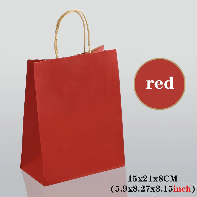 Red gift bag with gold handle on a gray background