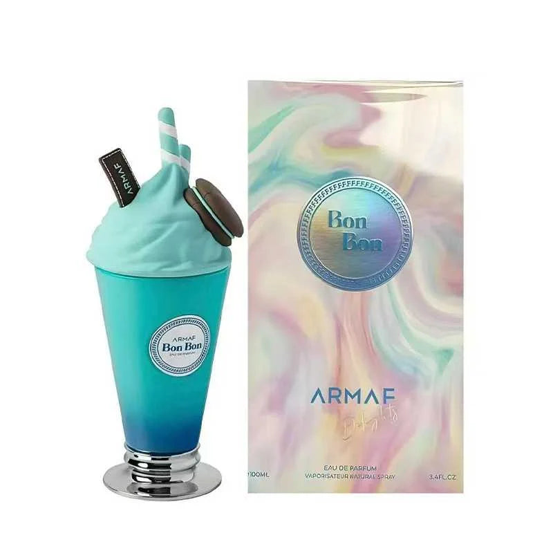 Armaf Bon Bon Eau de Parfum 120ml spray bottle styled like a milkshake with mint green whipped cream, a blue gradient cup, and cookie details, shown next to its pastel marbled packaging box.