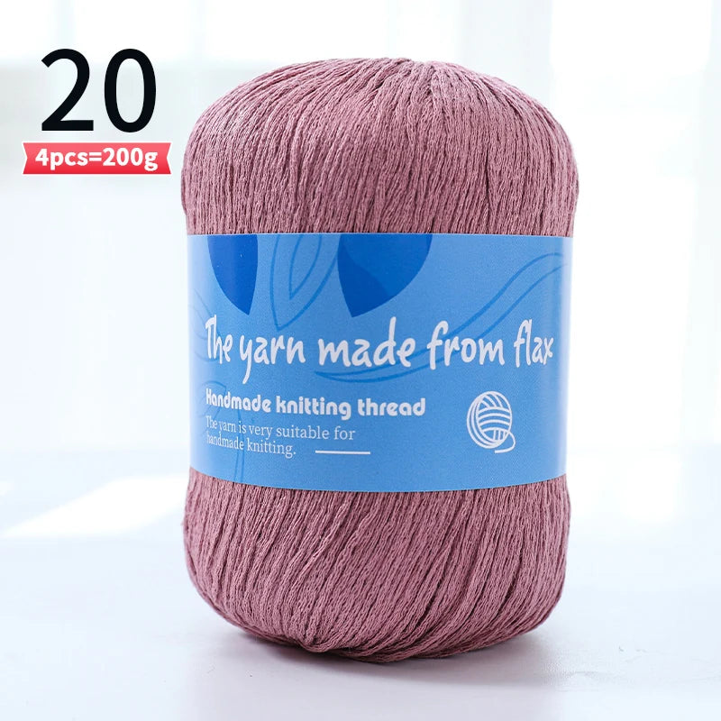 Dusty rose linen lace yarn skein, color code 20, with a blue flax label.