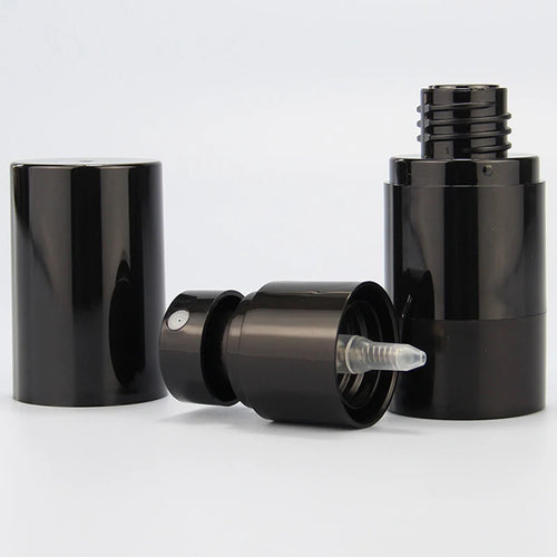 Black airless-style spray bottle disassembled to show cover, sprayer and threaded opening