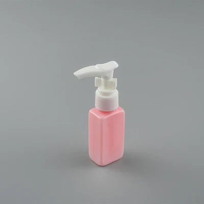 Pink rectangular PET bottle with white pump dispenser