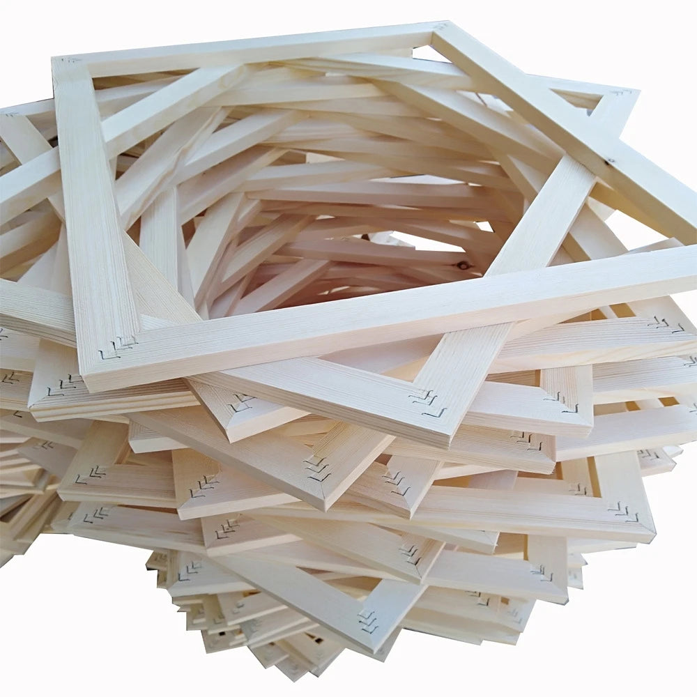 Stack of wooden picture frames on a white background