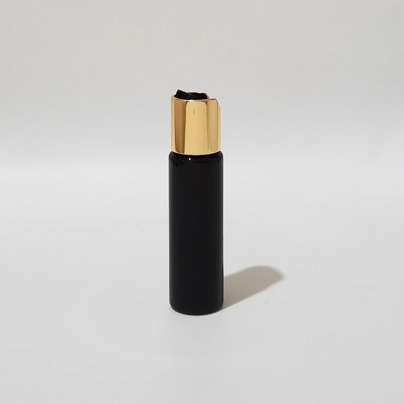 Black PET bottle with gold-tone disc-top cap and black insert, black-1