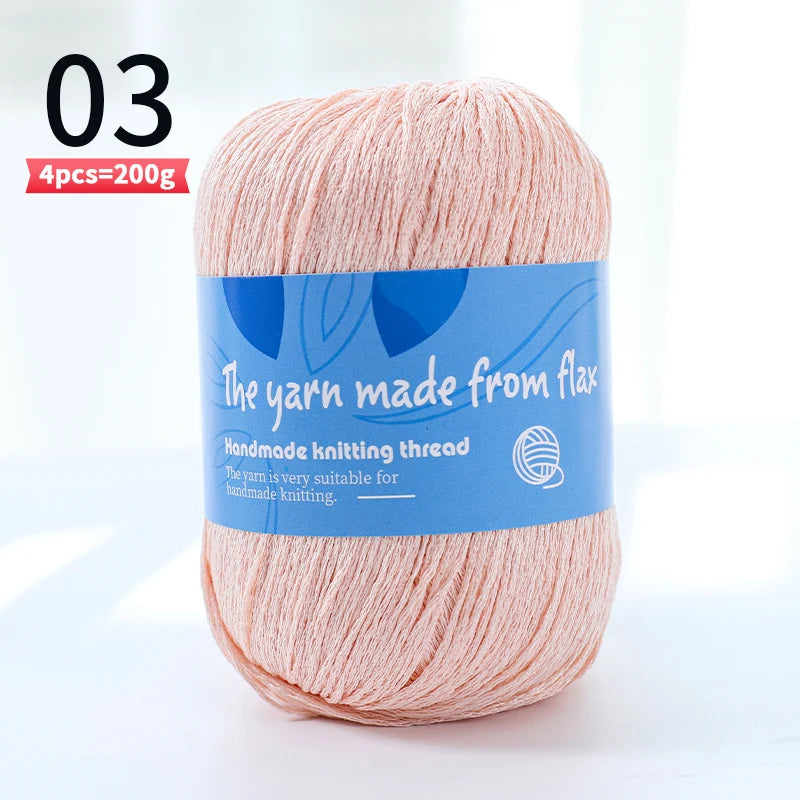 Pale blush pink linen lace yarn skein, color code 03, with a blue flax label.