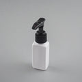 White rectangular PET bottle with black pump dispenser