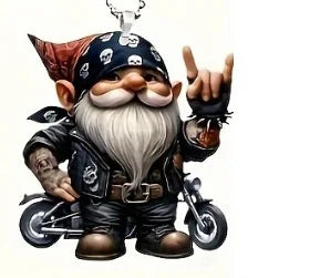 A biker-style gnome figurine wearing a black skull-patterned bandana, black leather jacket, and black pants, standing beside a small motorcycle and making a rock-on hand gesture. The image is isolated on a white background.