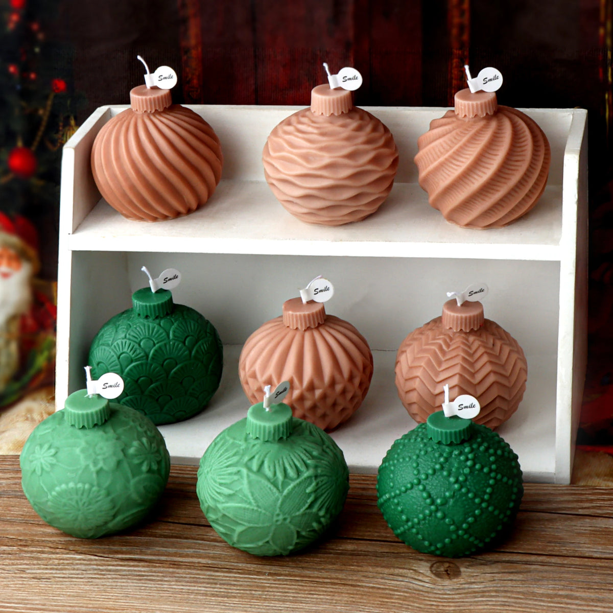 Nine ornament-ball casting examples displayed with spiral, floral, fan, lattice and dotted surface patterns