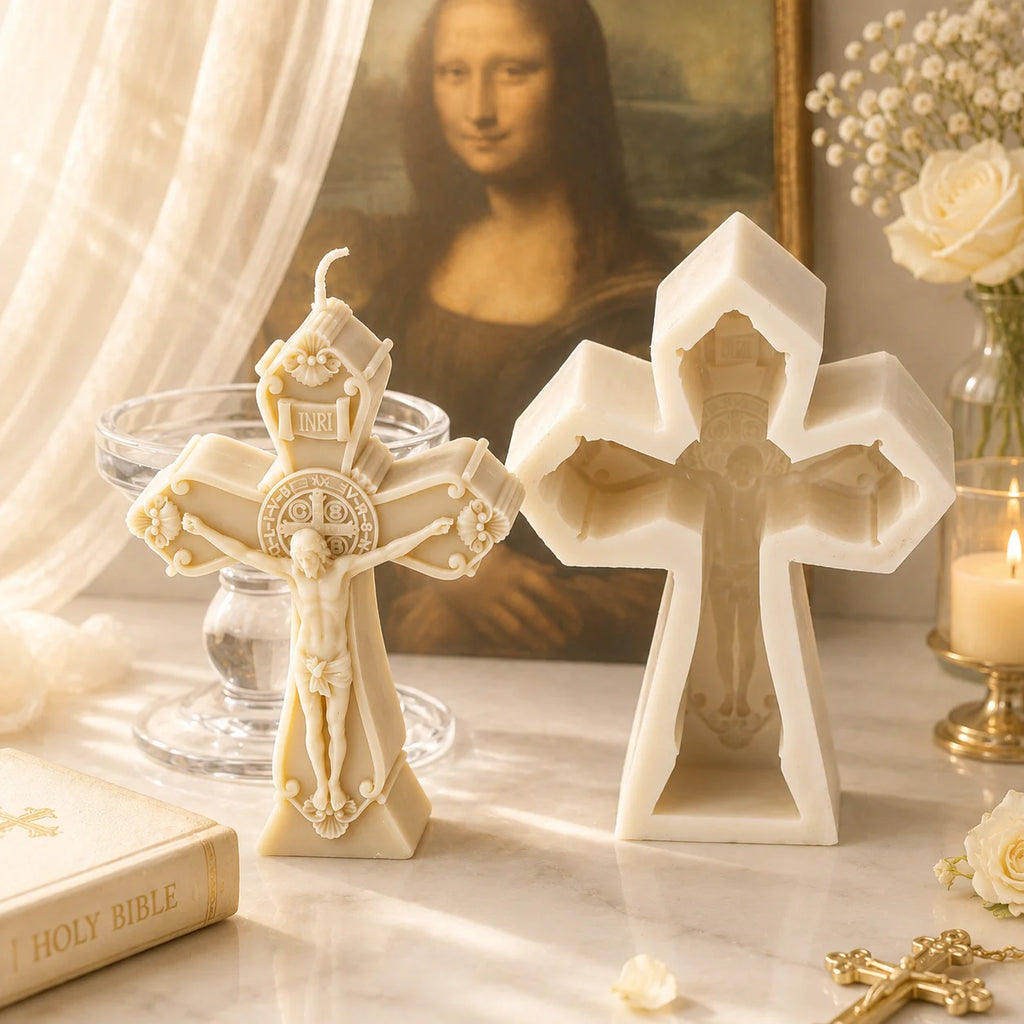 Ivory crucifix example with round medallion detail beside its white cross-shaped silicone mold