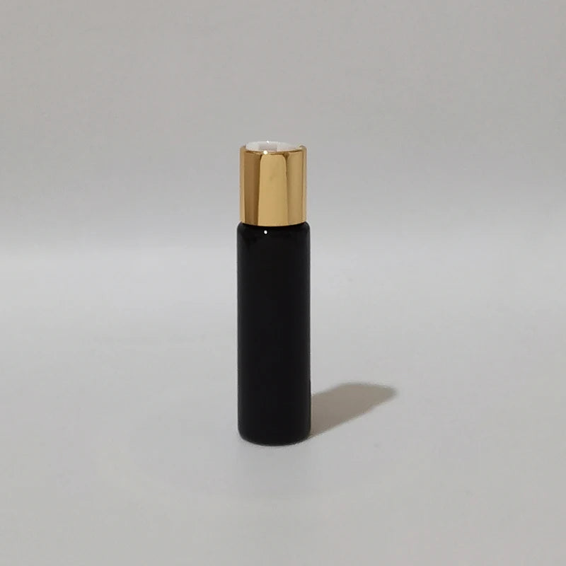 Black PET bottle with gold-tone disc-top cap and white insert, black-2