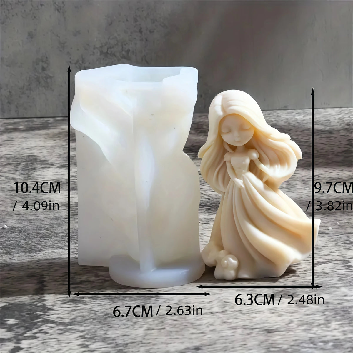 Long-haired princess doll example with sweeping gown beside white silicone mold with separate dimension labels